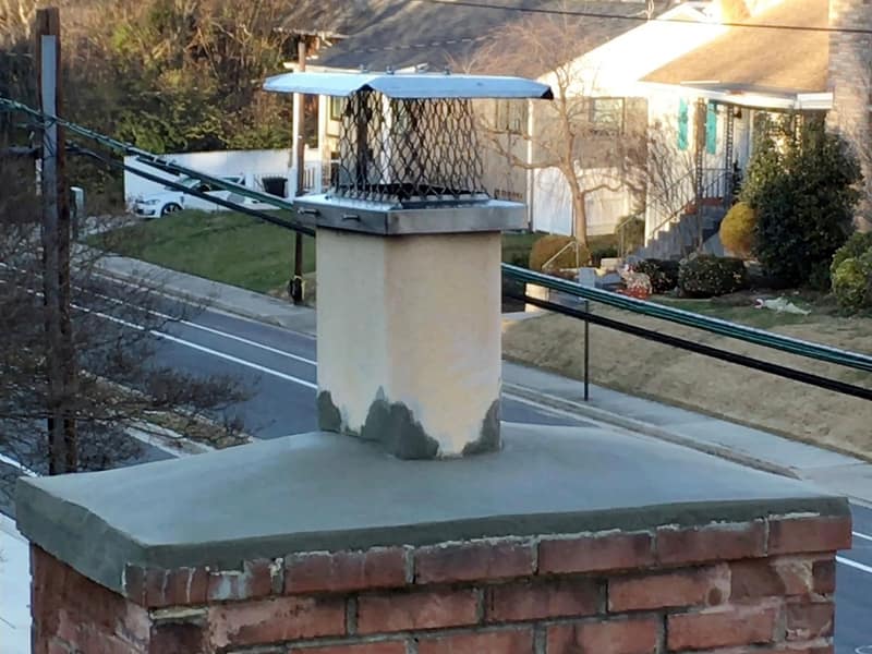 stainless mesh cap fitted above a new crown on a chimney in Hamilton, NJ