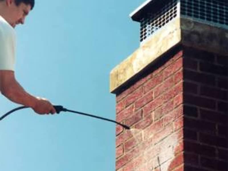 repellent sprayed across the brick face on a chimney in Hamilton, NJ